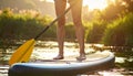Woman paddle boarding on SUP board in river, closeup Royalty Free Stock Photo