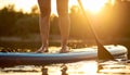 Woman paddle boarding on SUP board in river, closeup Royalty Free Stock Photo