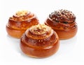 Three delicious sweet buns isolated on whites Royalty Free Stock Photo