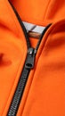 Orange sweatshirt with zipper as background, closeup view Royalty Free Stock Photo