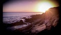 Coastal Sunset Over Rocky Shore Royalty Free Stock Photo