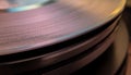Close-up of Stacked Vinyl Records with Grooves and Retro Reflections Royalty Free Stock Photo
