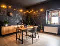 Creative home office with chalkboard wall, industrial desk, and modern loft interior design. Royalty Free Stock Photo