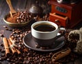 Black coffee in a cup on the background of coffee beans in a composition Royalty Free Stock Photo