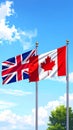 Great Britain and Canada, two flags waving against blue sky. 3d image Royalty Free Stock Photo