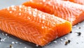 Raw Fillet of salmon with sea salt. Fresh fish. Royalty Free Stock Photo