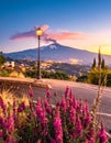 Mount Etna Volcano with smoke at dawn and the Catania city, Sicily island, Italy, Europa Royalty Free Stock Photo