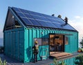 Modern shipping container home with solar panels install Royalty Free Stock Photo