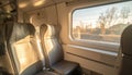 Train Interior with Golden Hour Sunlight Royalty Free Stock Photo