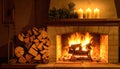 Cozy Fireplace with Burning Logs and Candles Royalty Free Stock Photo