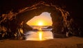 Sunset through a Sea Cave Archway Royalty Free Stock Photo