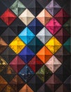 Dark background with colorful rhombus Royalty Free Stock Photo