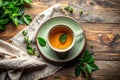 Warm Herbal Tea in Ceramic Cup on Rustic Wooden Table with Fresh Green Leaves, Natural Wellness Drink â AI-Generated Royalty Free Stock Photo