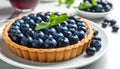 Delicious blueberry tart on plate, closeup Royalty Free Stock Photo
