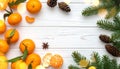Fresh tangerines, fir branches and cones on a white wooden table, flat. Bokeh lights Royalty Free Stock Photo