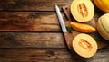 Cut a ripe melon on a wooden table, flatly. Text area Royalty Free Stock Photo