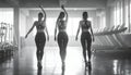 Three pretty girls workout in the gym, Rear View Royalty Free Stock Photo
