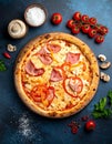 Flat lay with traditional Italian pizza with chiken, ham, pepper, cheese sauce Royalty Free Stock Photo