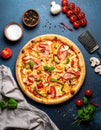 Flat lay with traditional Italian pizza with chiken, ham, pepper, cheese sauce Royalty Free Stock Photo