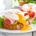 Toast with ham, mustard and poached egg Royalty Free Stock Photo