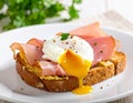 Toast with ham, mustard and poached egg Royalty Free Stock Photo