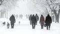 After a night of snow blizzard foggy morning silhouettes of passers citizens walking Royalty Free Stock Photo