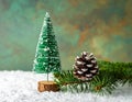 Christmas tree with a pinecone in tinsel Royalty Free Stock Photo