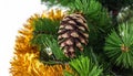 Christmas tree with a pinecone in tinsel Royalty Free Stock Photo
