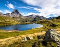 Taking in the view of Midi d\'Ossau beyond Lac Gentau beside the GR10 trekking route Royalty Free Stock Photo