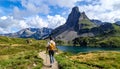Taking in the view of Midi d\'Ossau beyond Lac Gentau beside the GR10 trekking route Royalty Free Stock Photo