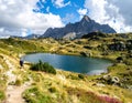 Taking in the view of Midi d\'Ossau beyond Lac Gentau beside the GR10 trekking route Royalty Free Stock Photo