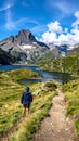Taking in the view of Midi d\'Ossau beyond Lac Gentau beside the GR10 trekking route Royalty Free Stock Photo