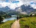 Taking in the view of Midi d\'Ossau beyond Lac Gentau beside the GR10 trekking route Royalty Free Stock Photo