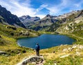 Taking in the view of Midi d\'Ossau beyond Lac Gentau beside the GR10 trekking route Royalty Free Stock Photo