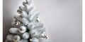 White Christmas Tree With Silver Ornaments for Festive Decor and Holiday Elegance in Modern Home Royalty Free Stock Photo
