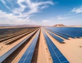 Expansive solar farm in a desert landscape, likely indicating an arid region Royalty Free Stock Photo