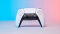 Modern White Gaming Controller with Neon Blue and Pink Gradient Background Royalty Free Stock Photo