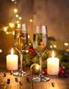 Champagne For Christmas Celebration - Flutes With Candle Decoration Royalty Free Stock Photo