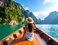 Woman enjoying on long tail boat in Khao Sok National Park, Suratthani Thailand Royalty Free Stock Photo