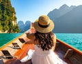 Woman enjoying on long tail boat in Khao Sok National Park, Suratthani Thailand Royalty Free Stock Photo