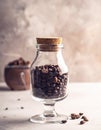 Coffee beans in glass jar. Toned photo Royalty Free Stock Photo