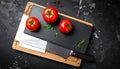 Mock-up for food bars cafes restaurant pizzerias with slate and tomato Royalty Free Stock Photo