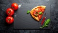 Mock-up for food bars cafes restaurant pizzerias with slate and tomato Royalty Free Stock Photo