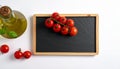 Mock-up for food bars cafes restaurant pizzerias with slate and tomato Royalty Free Stock Photo