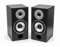 Two modern black wooden speaker cabinets with a sleek design Royalty Free Stock Photo
