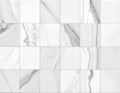 Square tiles arranged in a grid pattern, featuring a white marble texture Royalty Free Stock Photo