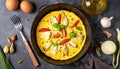 Frying pan with scrambled eggs stuffed with edible yucca flowers.Diet omelet Royalty Free Stock Photo