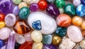Different beautiful gemstones as background, top view Royalty Free Stock Photo