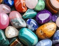 Different beautiful gemstones as background, top view Royalty Free Stock Photo