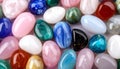 Different beautiful gemstones as background, top view Royalty Free Stock Photo